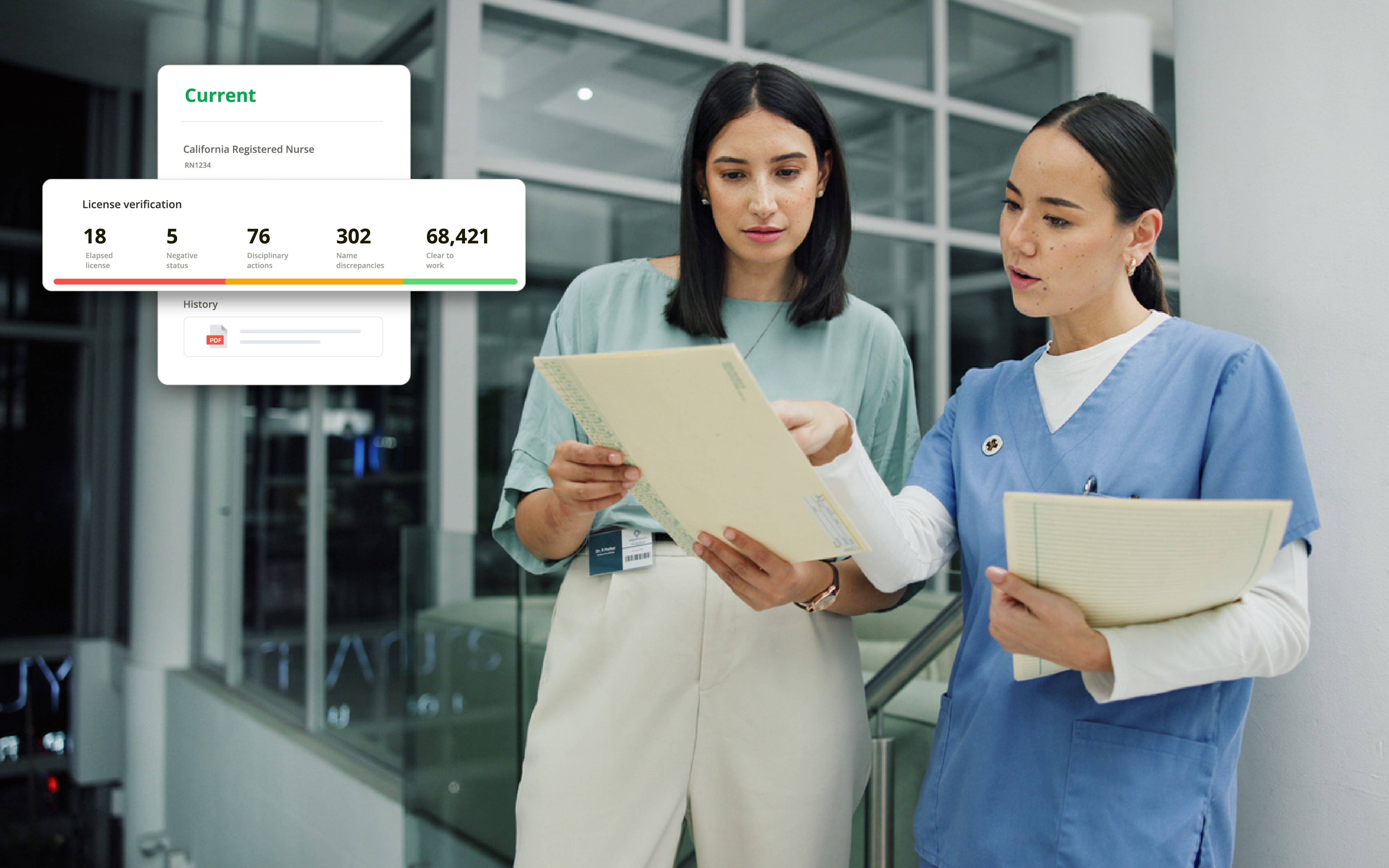 Two women reviewing a chart