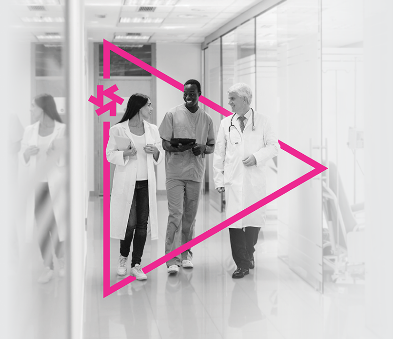Black and white photo of three healthcare professionals smiling with a pink Propelus logo overlaid